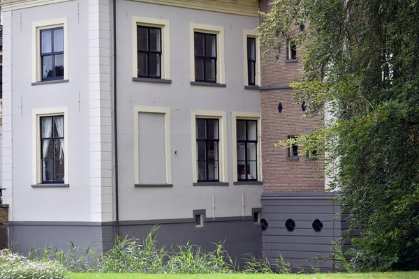 What is the best approach to weatherproofing UK sash windows in a period property?